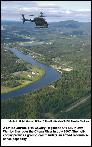 A 6th Squadron, 17th Cavalry Regiment, OH-58D Kiowa Warrior flies over the Chena River in July 2007.
